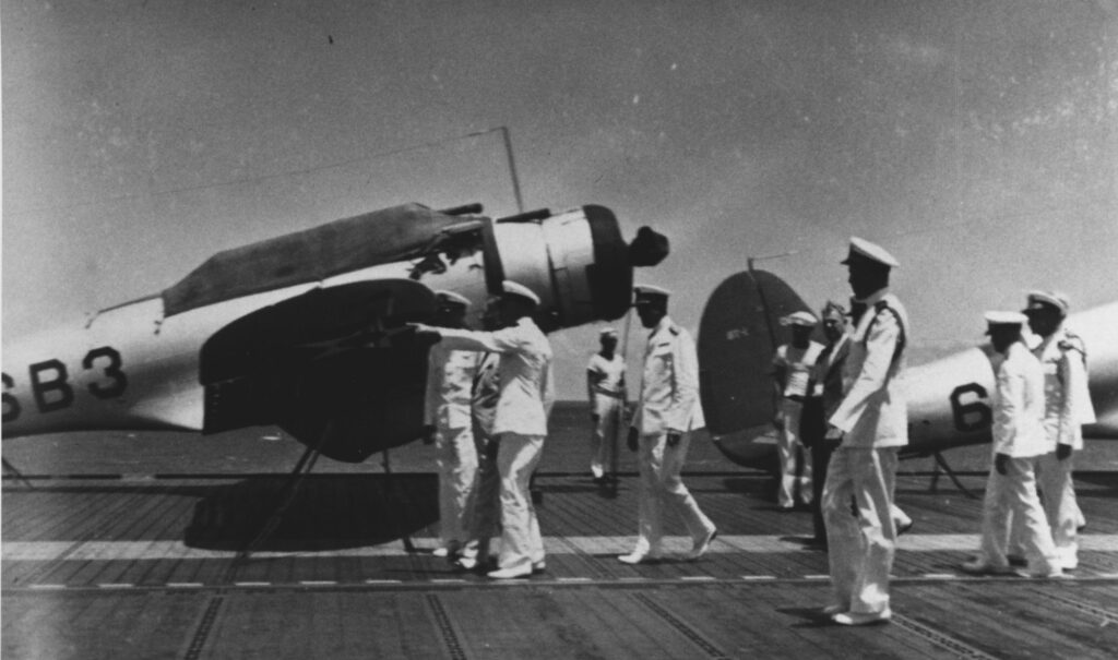 U.S. Secretary of the Navy Frank Knox inspecting Northrop BT-1s on board USS Enterprise (CV-6)