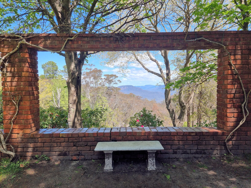 Brickwork used to frame the surrounding landscape Everglades House and Gardens Leura