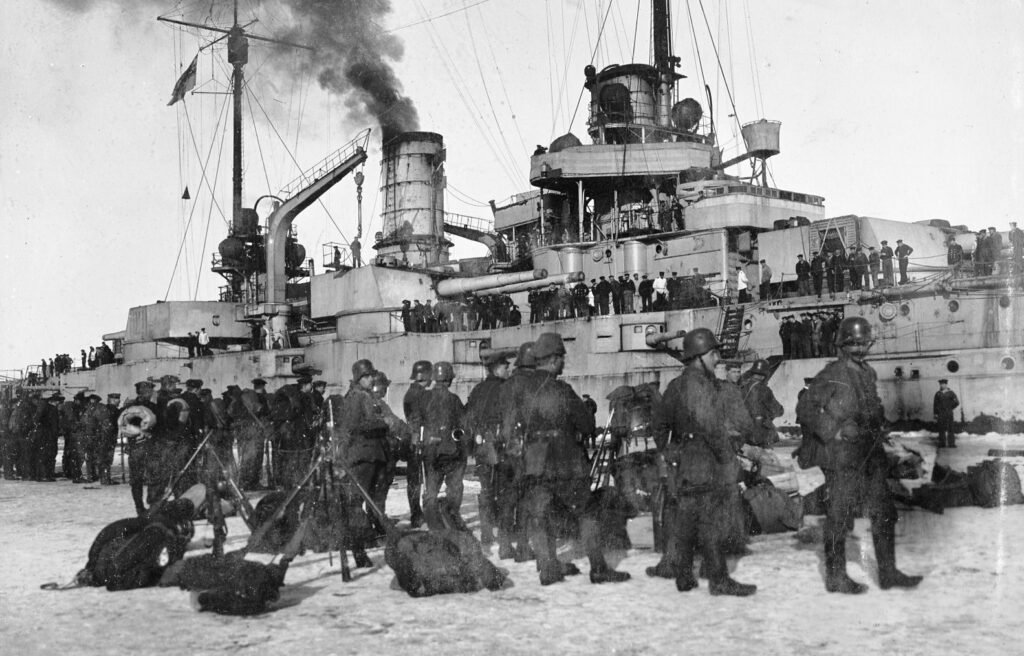 German soldiers in Eckerö in front of SMS Westfalen March 1918