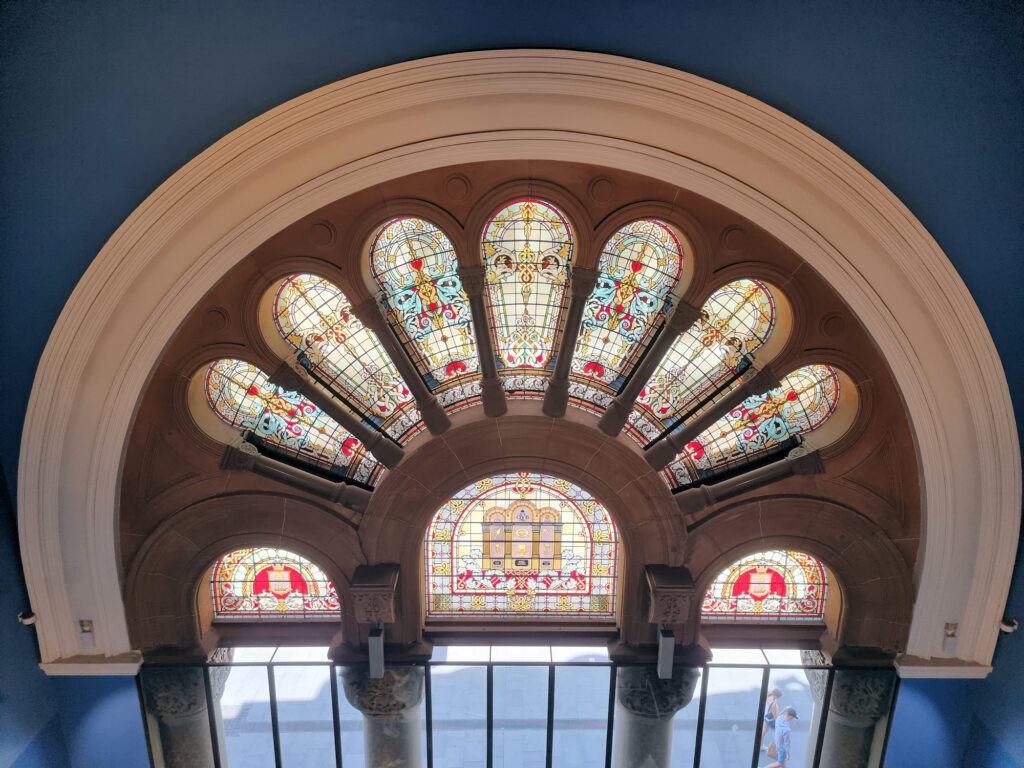 Stained glass window over the entrance Queen Victoria Building