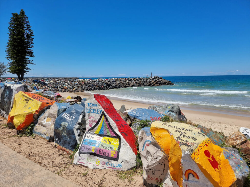 Decorated rocks on the Port Macquarie breakwall