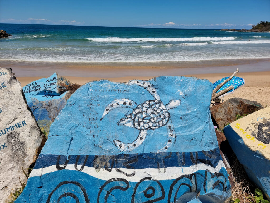 Decorated rocks on the Port Macquarie breakwall