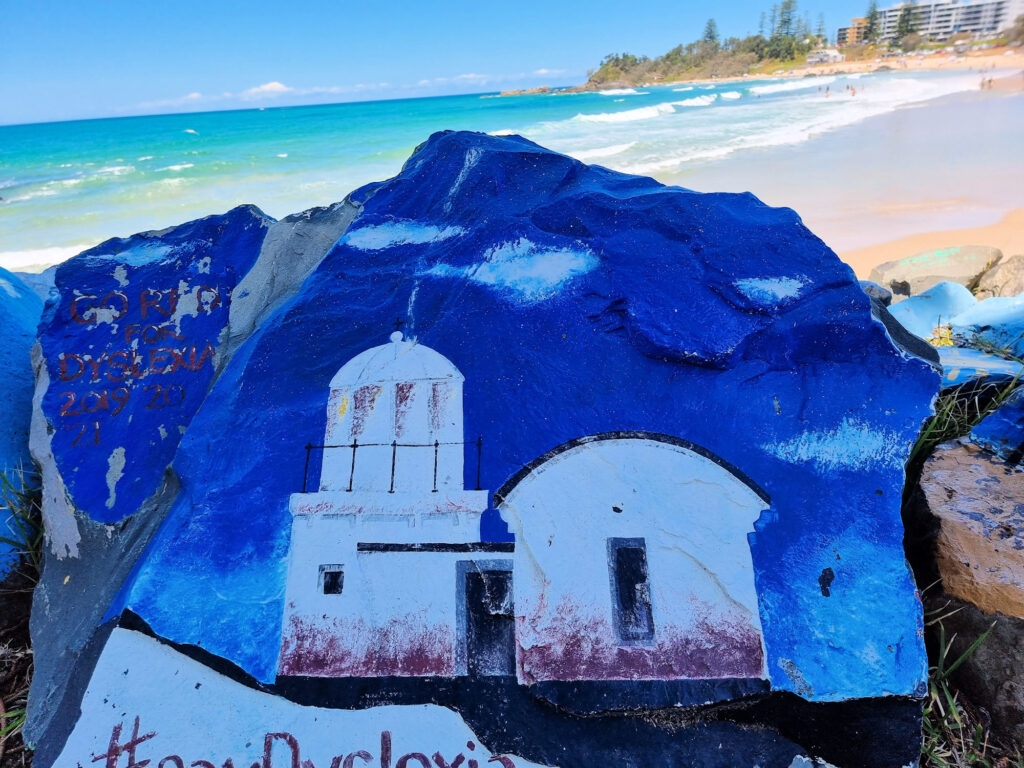 Decorated rocks on the Port Macquarie breakwall