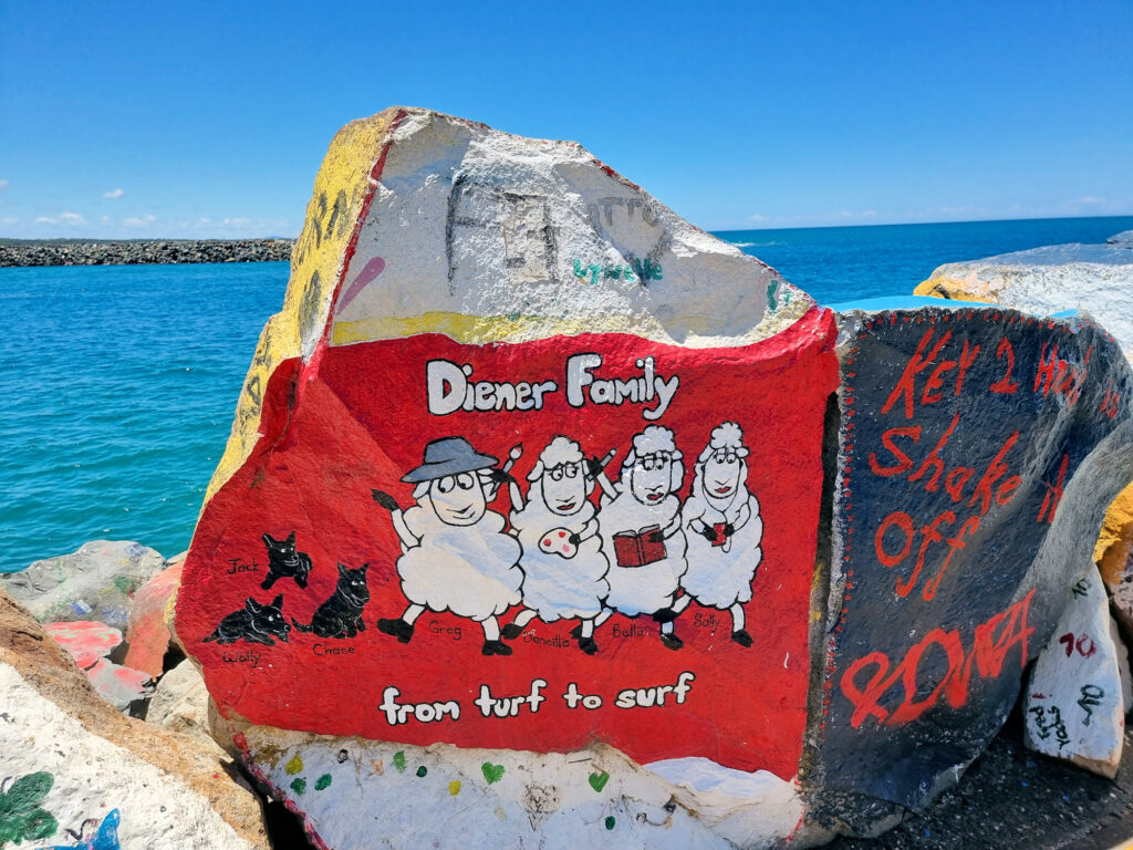 Decorated rocks on the Port Macquarie breakwall