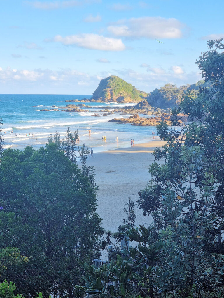 Looking Through Trees to Flynns Beach