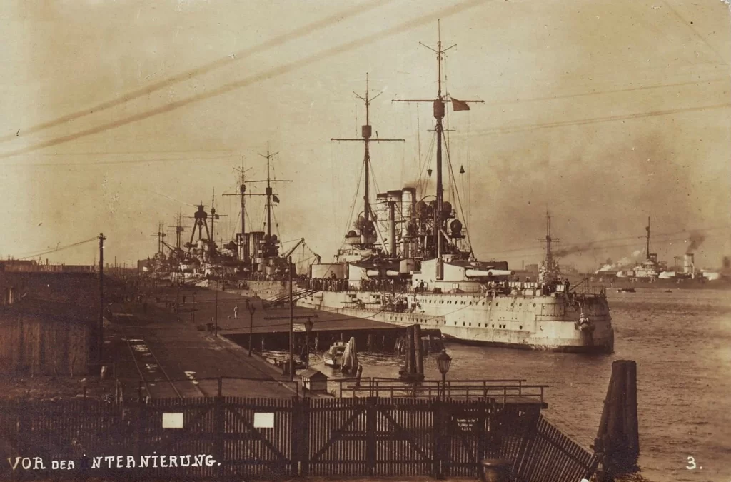 High Seas Fleet dockside at Wilhelmshaven, sometime during WW1. The dreadnought in the foreground is SMS Helgoland