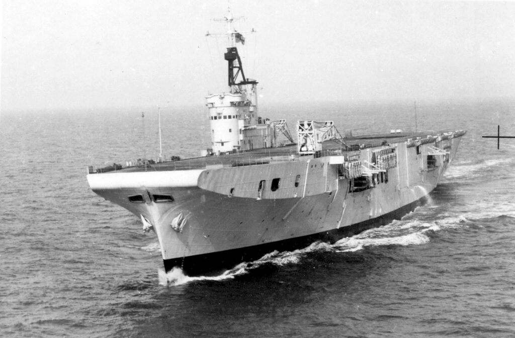 HMS Perseus in her configuration as an Aircraft Ferry Carrier. November 1951