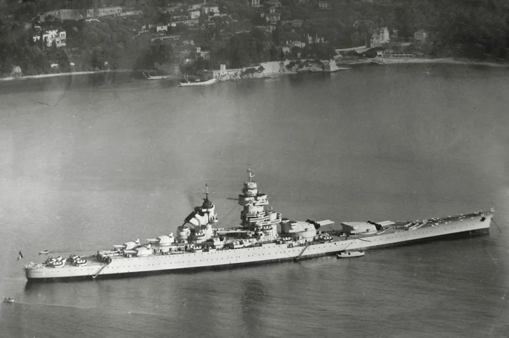 Richelieu at anchor in the 1950's, likely off Villefranche.