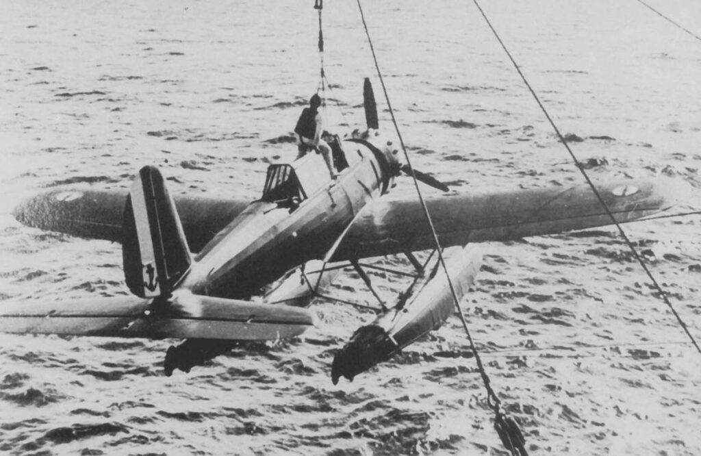 Arado Ar 196A-2 of BordFlGr196 with Fake French Navy markings to confuse enemy. Being loaded onto Auxiliary Cruiser Commerce Raider No.21 Widder in 1939