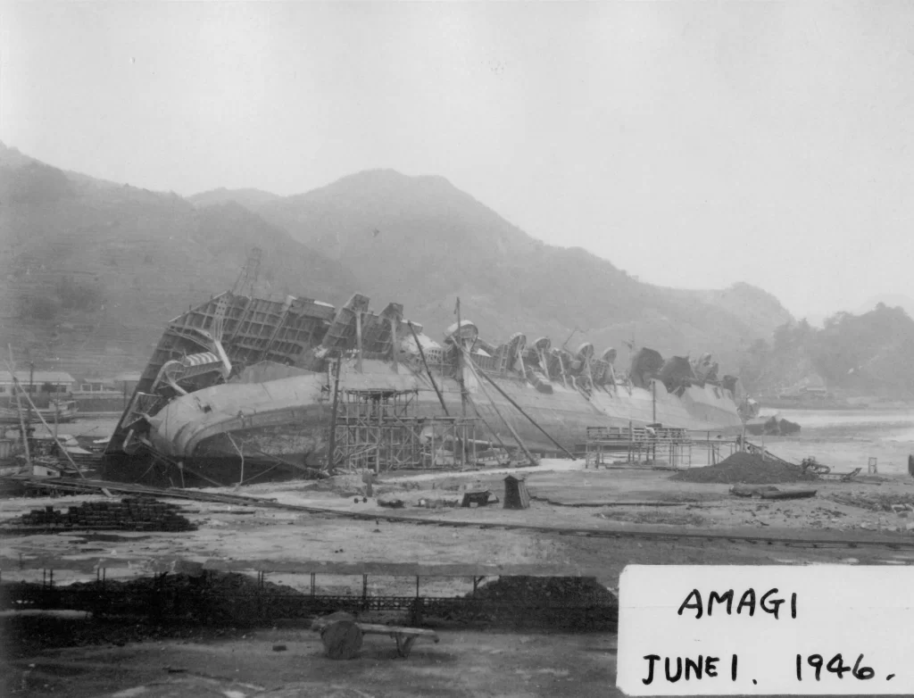 Early salvage operations on the hulk of the IJN aircraft carrier Amagi, June 1, 1946