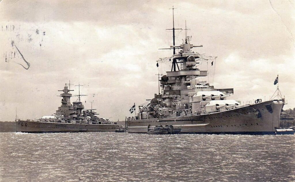 Graf Spee and battleship Gneisenau in Kiel, 1938.