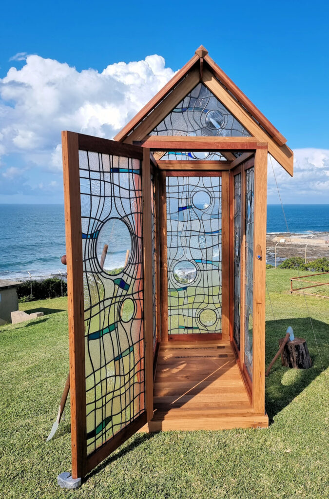 The Leadlight Garden Shed with Glass and Timber Tools by Lee and Zac Howes Sculptures at Scratchley