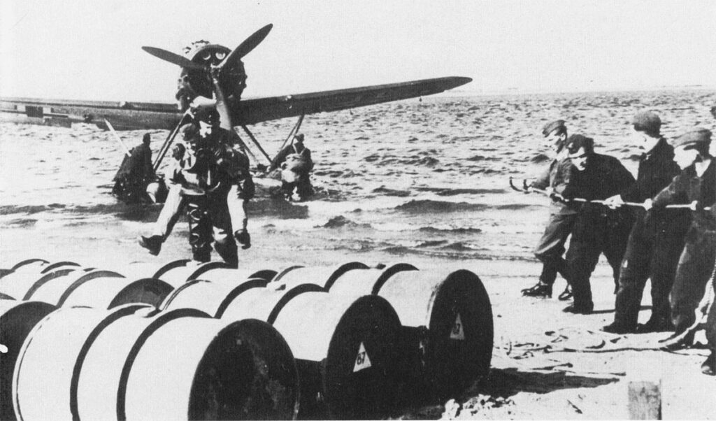 Arado Ar 196A-2 of 5./BFGr.196 (CK+FC) vkz (6W+FN) WkNr. 100088 Crew Carried Ashore While Ground -Crew Pull Aircraft Onshore