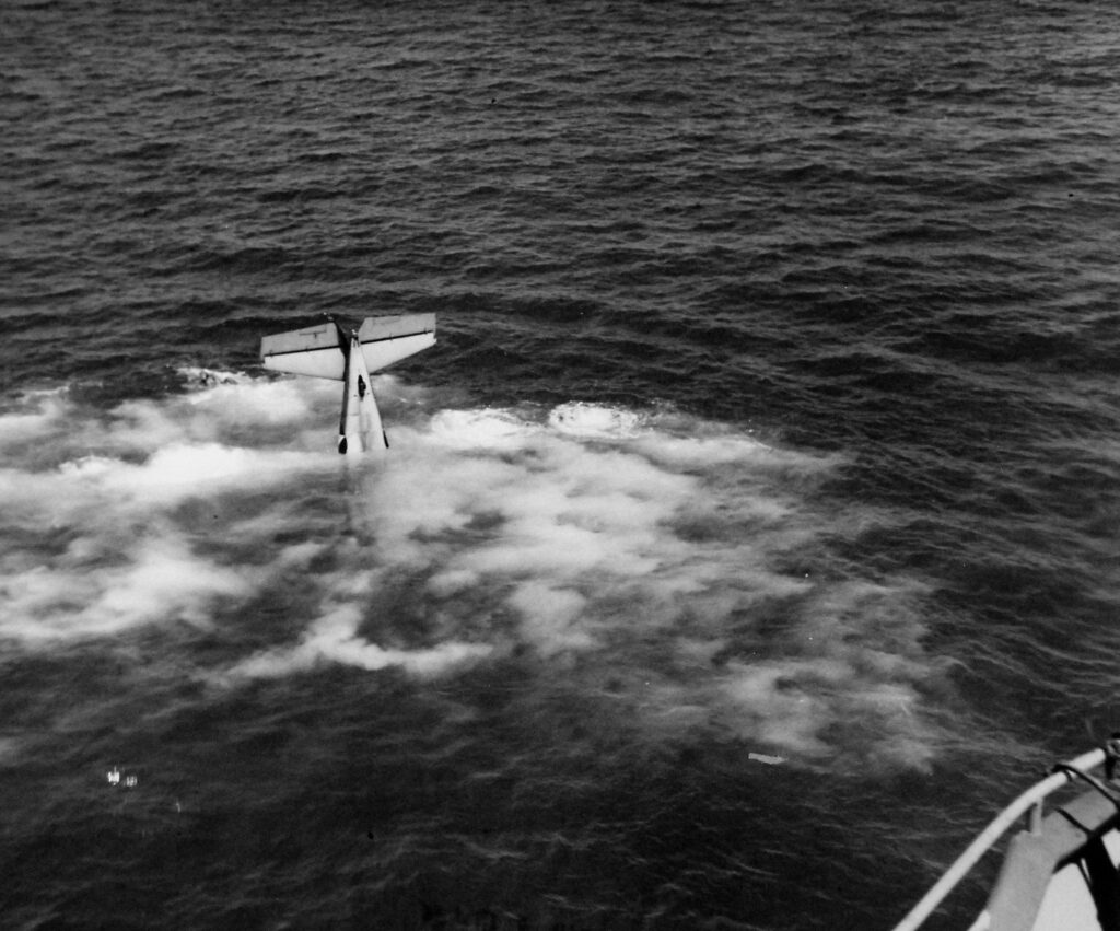 F4F-4 Wildcat (# 12108) release ring failed. Plane taxied off bow of USS Bogue CVE-9 and crashed. Pilot, Lieutenant R.L. Johnson, was uninjured