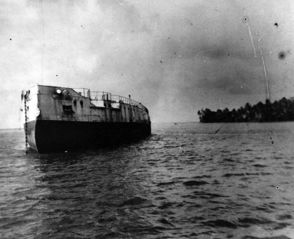 USS Oregon IX-22 seen as an ammunition barge at Guam in the 1940s