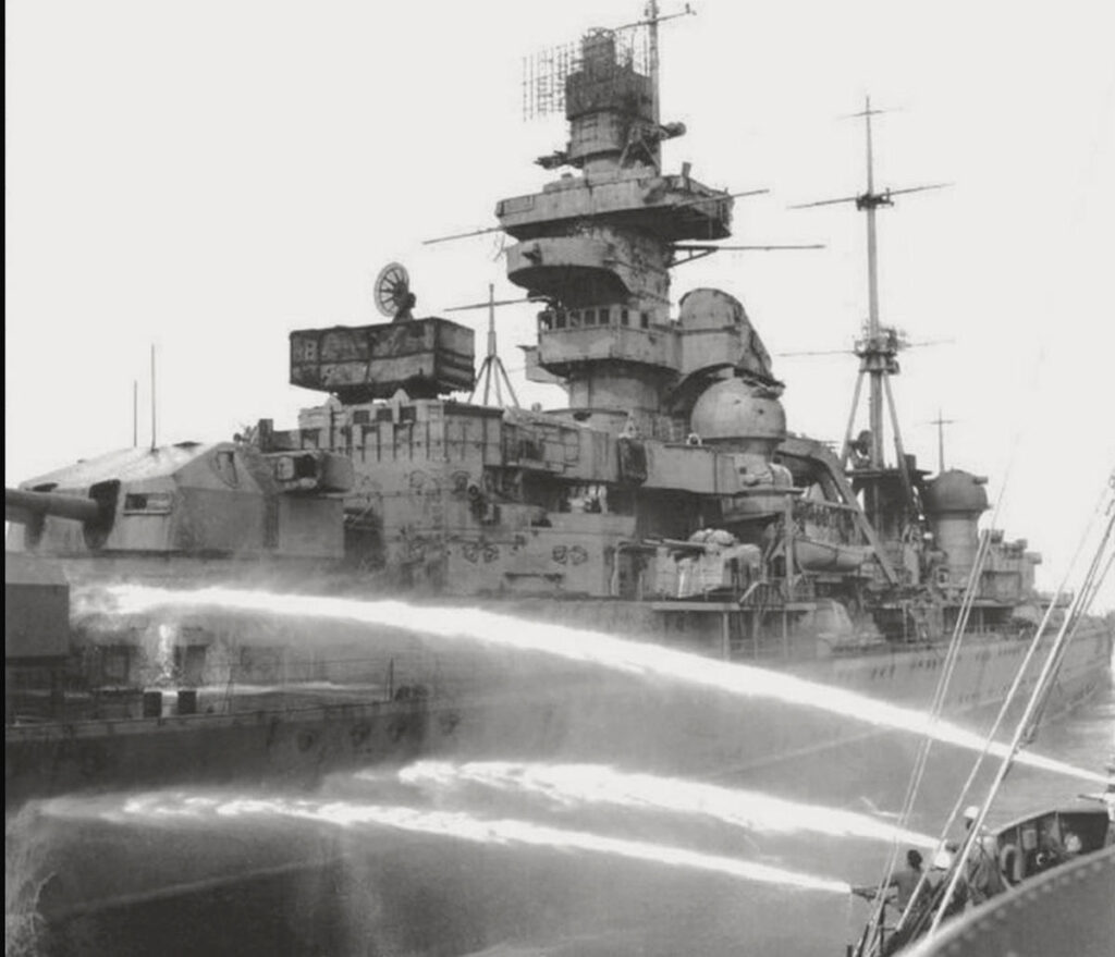 Prinz Eugen being decontaminated after serving as target in nuclear tests. Bikini Atoll - July 1946