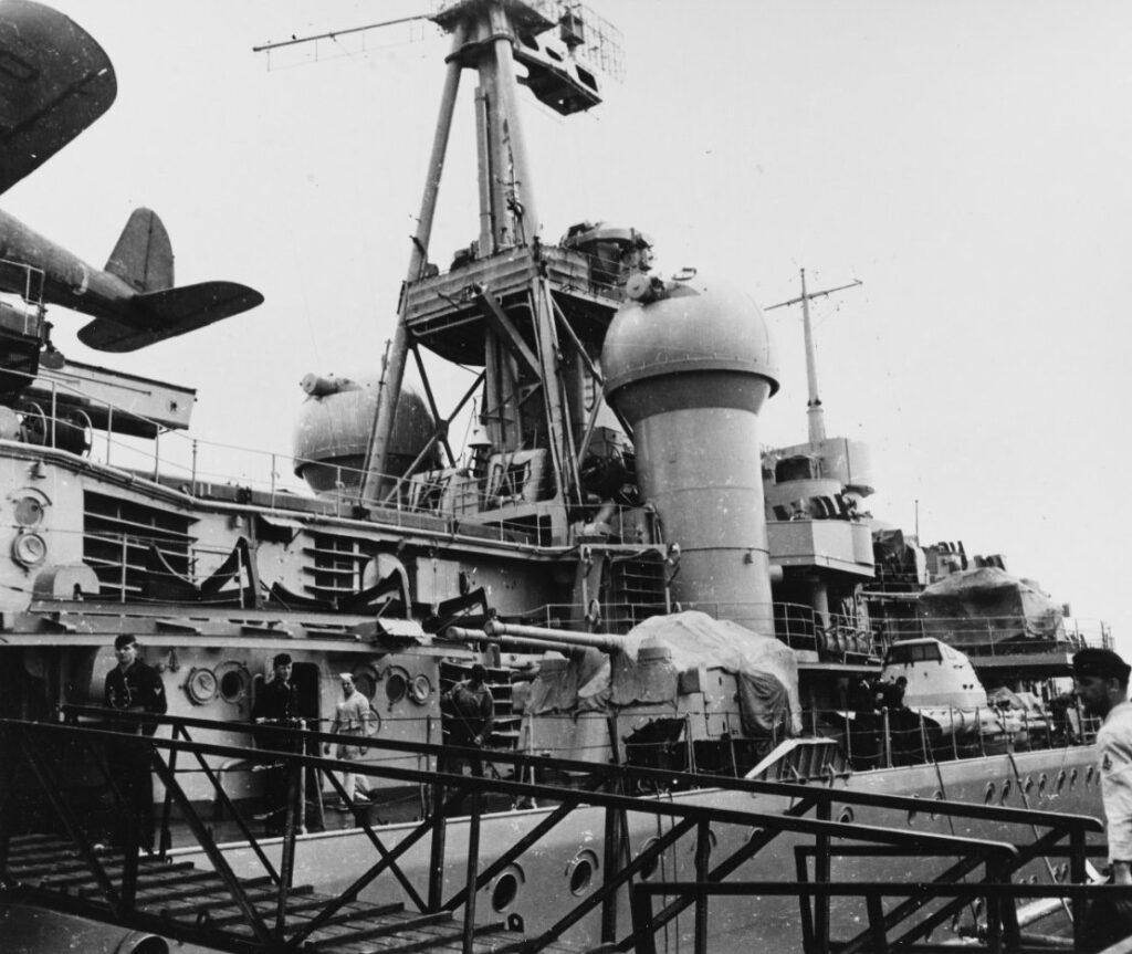 After port superstructure, looking aft from alongside, soon after V-E Day