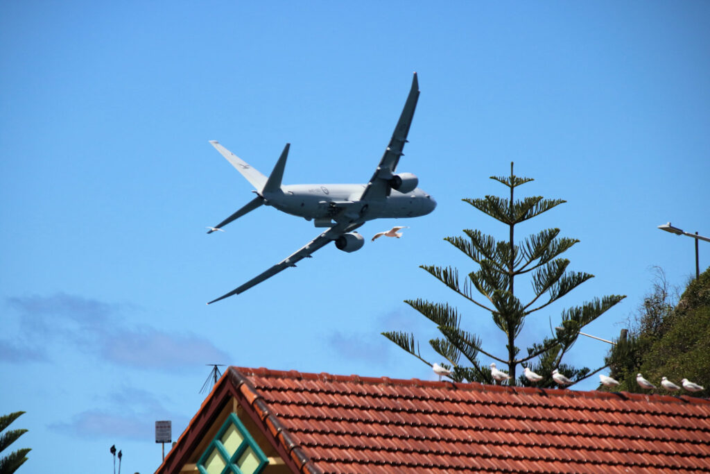 Boeing P-8A Poseidon flying over the Nobbys Beach Surf Club Newcastle Williamtown Air Show 2023