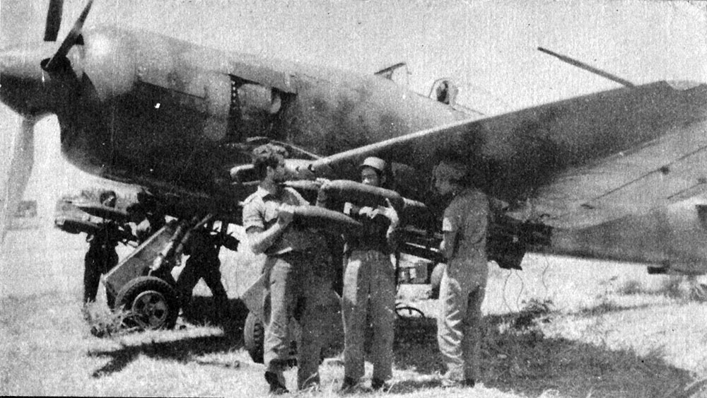 Loading rockets onto a Cuban Sea Fury