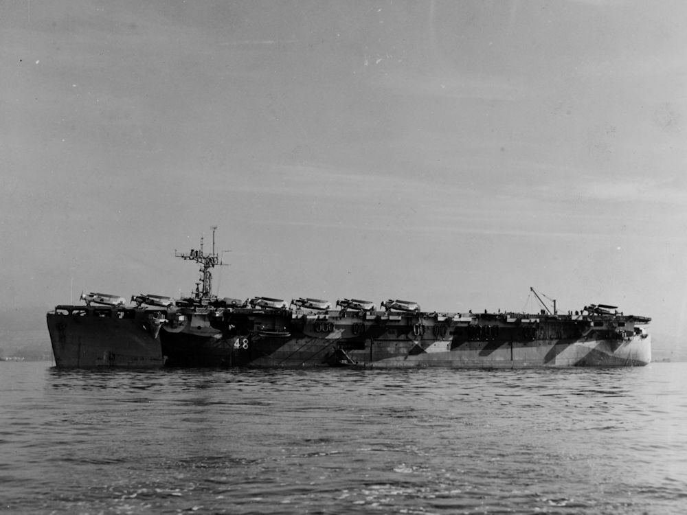 HMS Campania D48 at anchor 22 June 1944