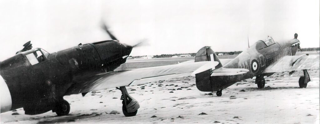 Macchi MC202 Folgore of 4 Stormo 9 Gruppo 73Sqa with a captured Hurricane MkIIa HAD Z2491. Sicily