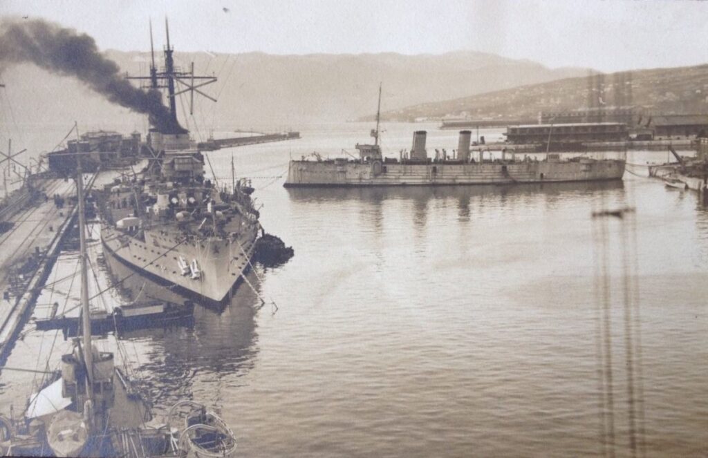 Dante Alighieri, left, and the auxiliary ship Cortellazzo (former armoured cruiser Marco Polo), right, Fiume harbour, December 1920