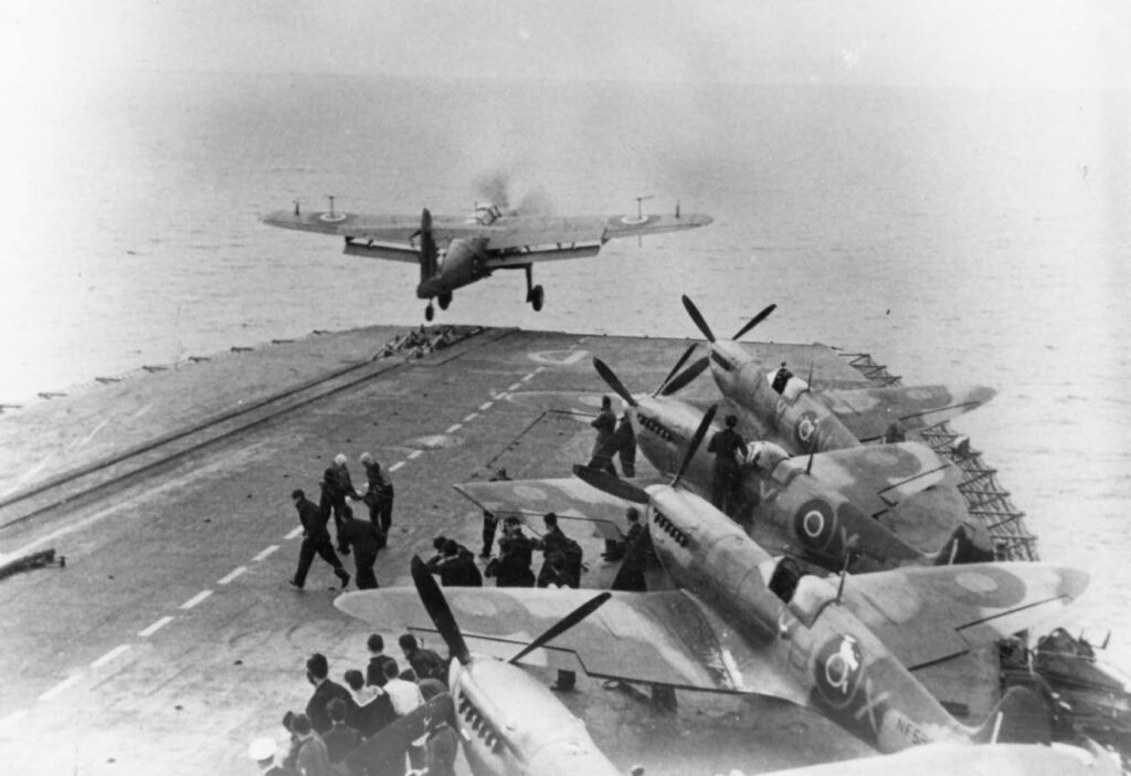 Fairey Barracuda Taking Off from HMS Furious with Supermarine Seafire Mk. LIIIs