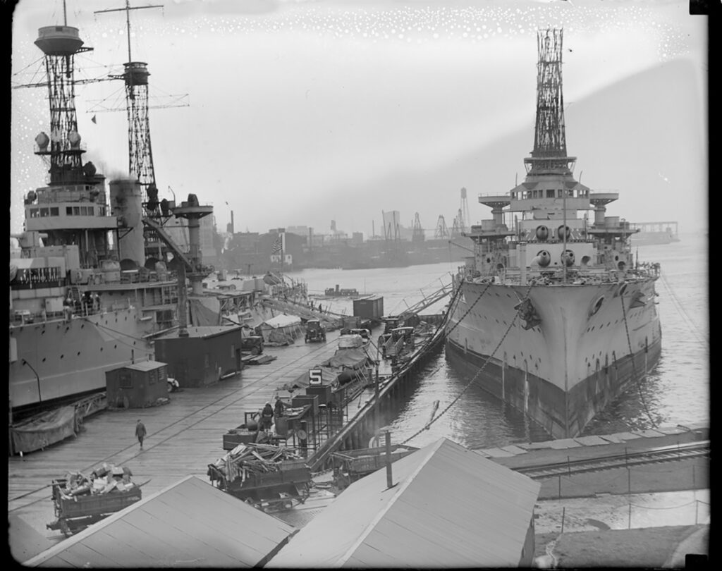 The beginning of USS Delaware (BB-28) being scrapped. Florida (BB-30) is to the left