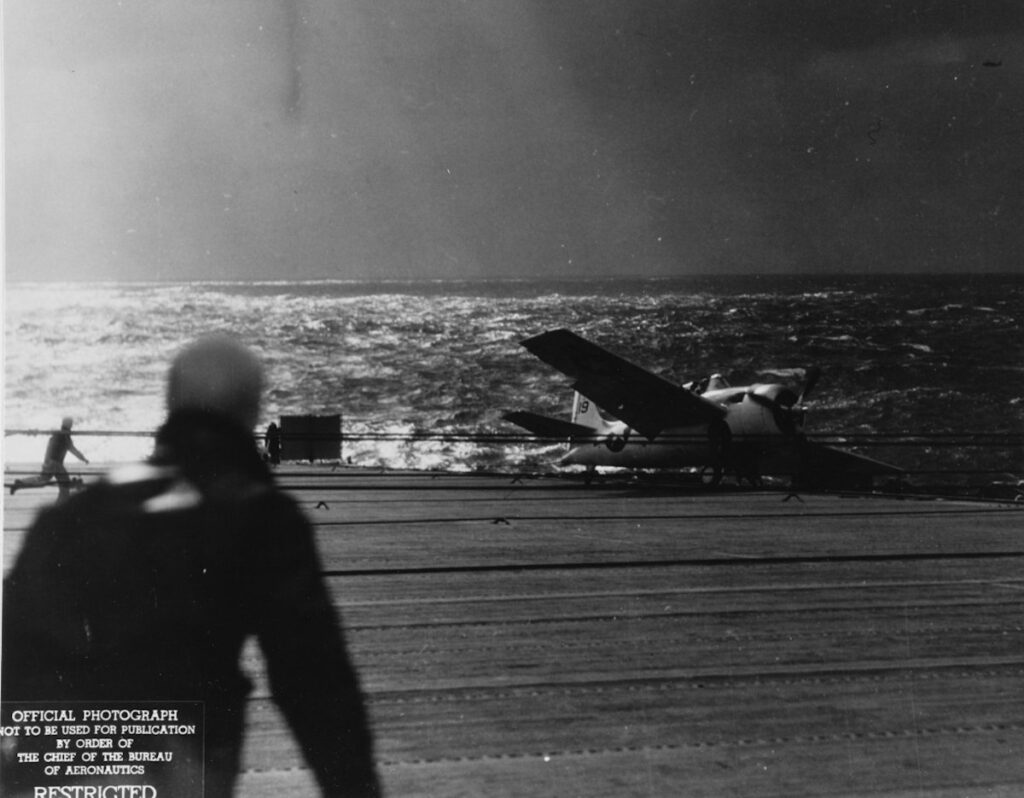 Crash of General Motors FM-2 Wildcat #19 into the ship's port stacks, while landing, North Atlantic, 16 April 1944