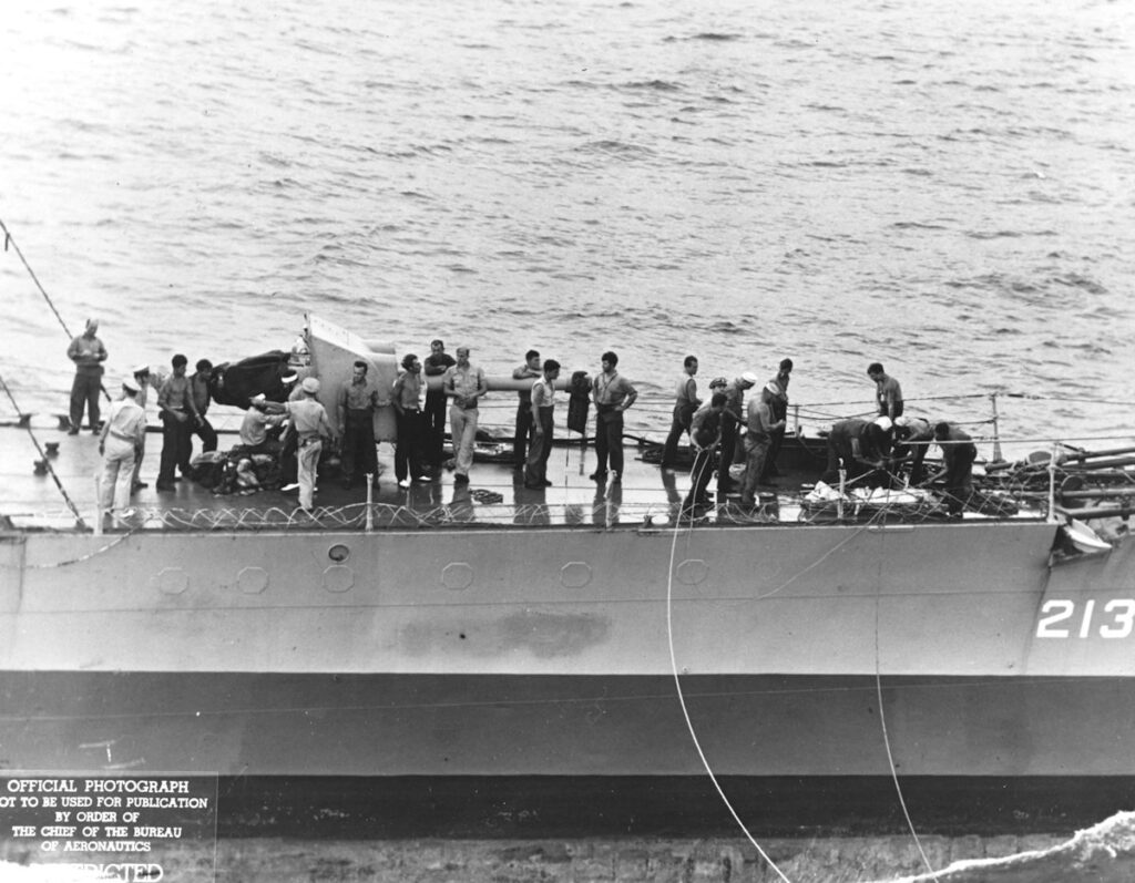 German prisoners of U-185 aboard USS Barker (DD-213) 24 August 1943 alongside USS Core