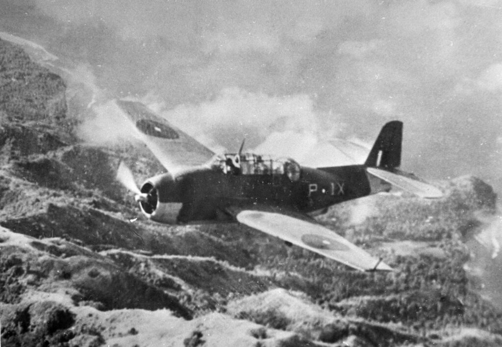 Grumman Avenger Mk.II 849 NAS HMS Victorious over an island in the Indian Ocean, ca. 1944