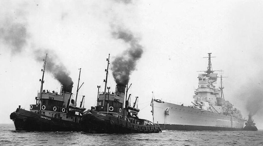 HMS Howe being towed to Inverkeithing for scrapping