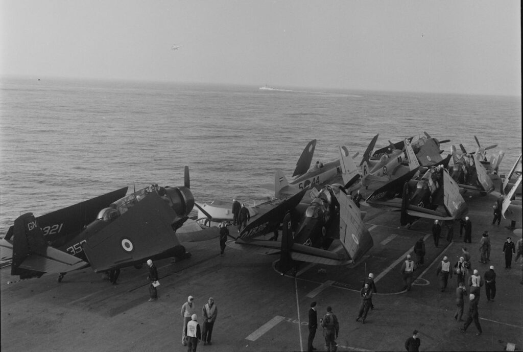 Grumman Avenger and Hawke Sea Fury on HMS Illustrious. Post war. Note the Dutch Sea Fury.