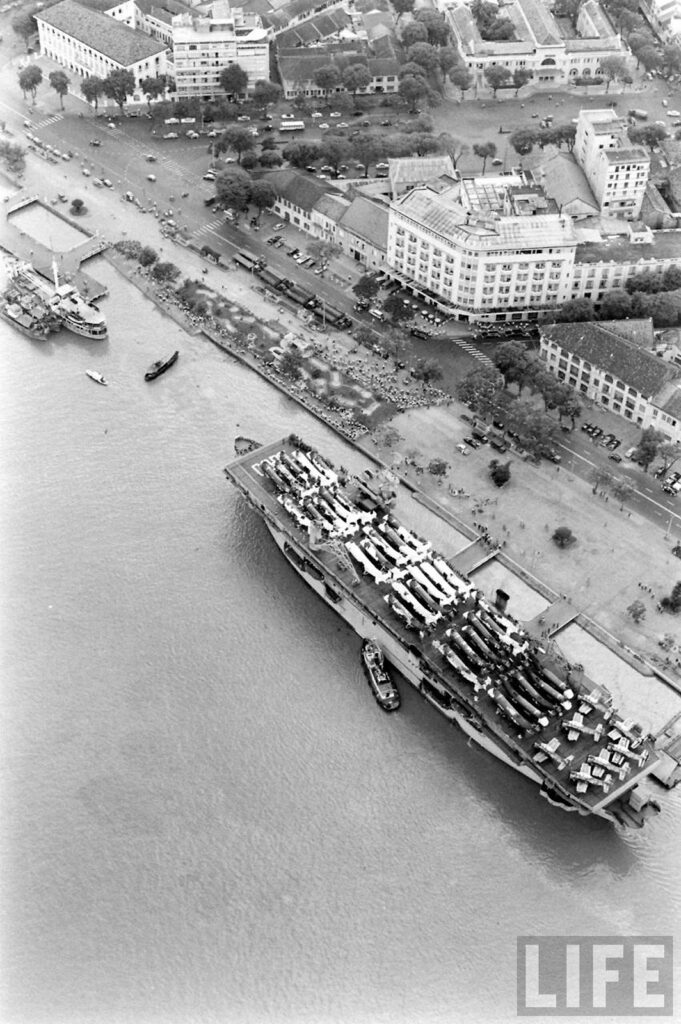 USNS Core (T-AKV 41) in Saigon River 1961