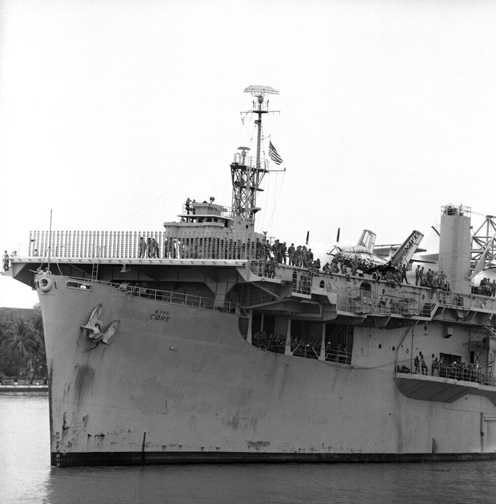 USNS Core (T-AKV-41) docks in Saigon Feb. 7, 1962