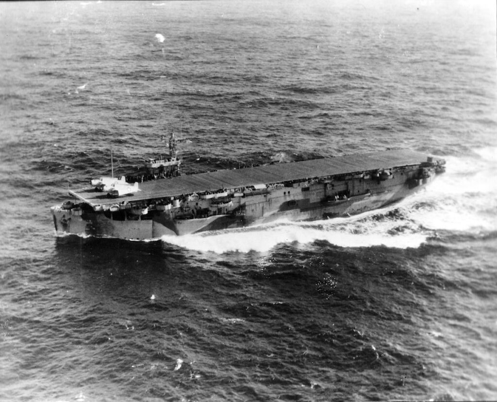 USS Core (CVE-13) underway, circa 1944. She is camouflaged in Measure 32, Design 4A scheme