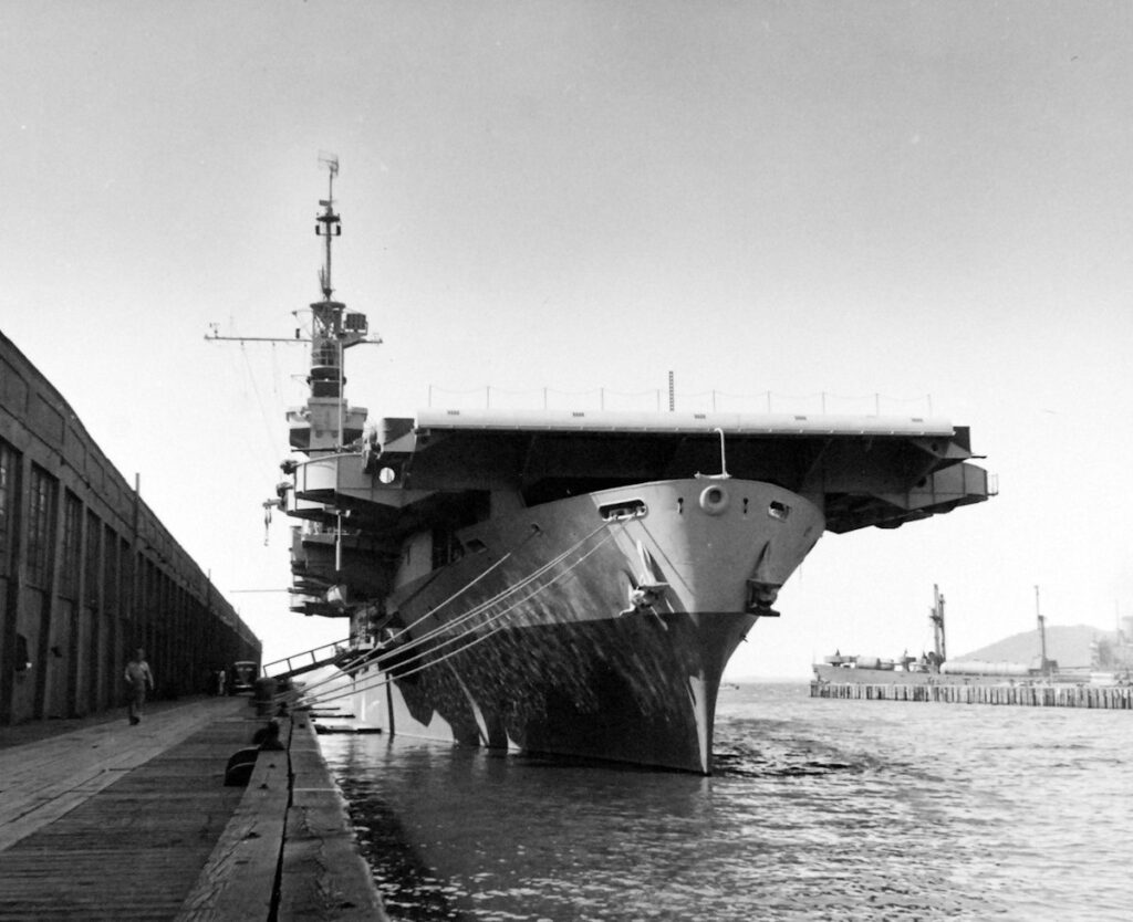 USS Liscome Bay (CVE-56) moored at Naval Station Astoria, Oregon, 2 September 1943, one month after being commissioned