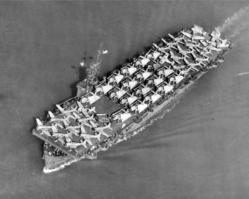 USS Liscome Bay (CVE-56) underway with a load of SBD Dauntlesses, TBF Avengers on Sept. 20, 1943