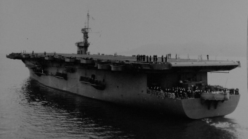 USS Matanikau (CVE-101), heading out to sea, taken on 13 July 1944