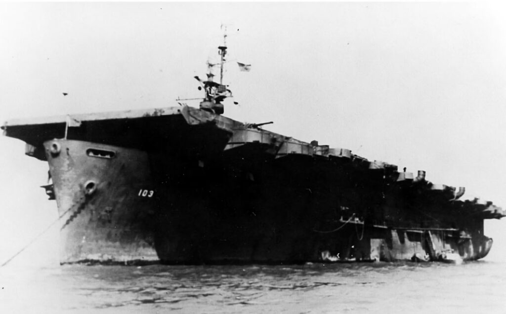 USS Roi (CVE-103) at anchor, circa 1945-1946.