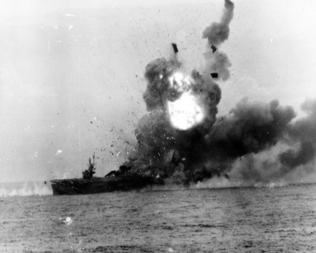 The second explosion, a major detonation (probably caused by a pair of torpedoes lying almost in the center of a fire on USS St. Lo (CVE-63)