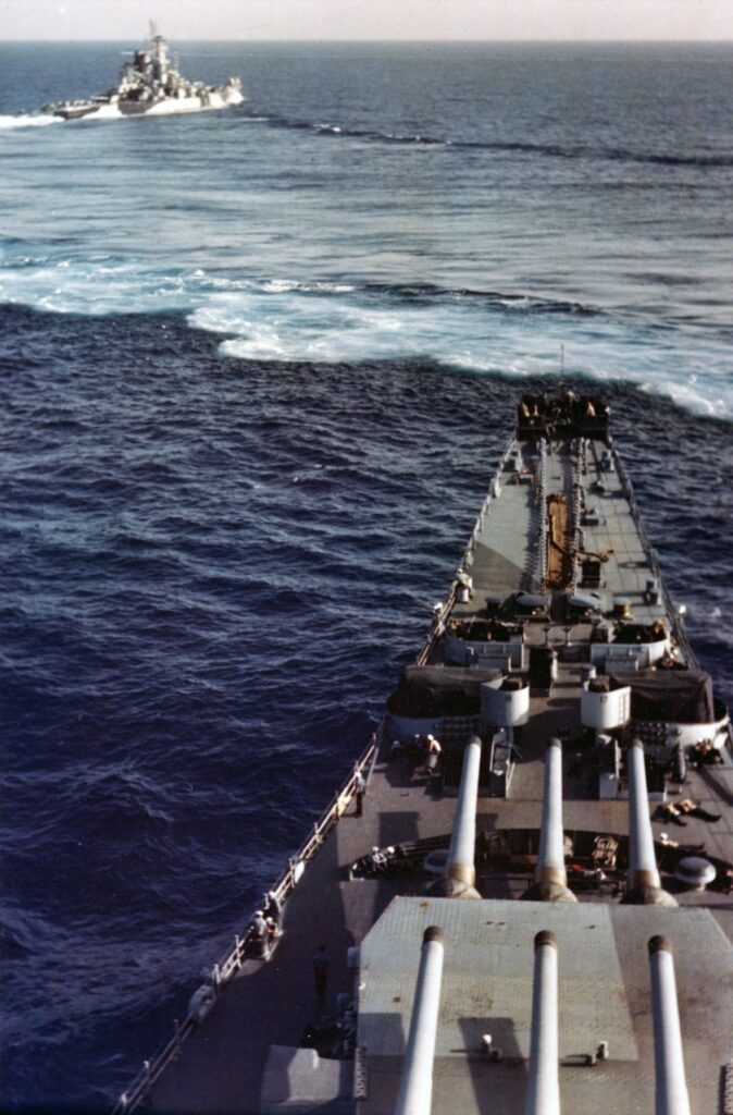 USS Alaska (CB-1) maneuvers in front of USS Missouri (BB-63) during their shakedown cruise, circa August 1944