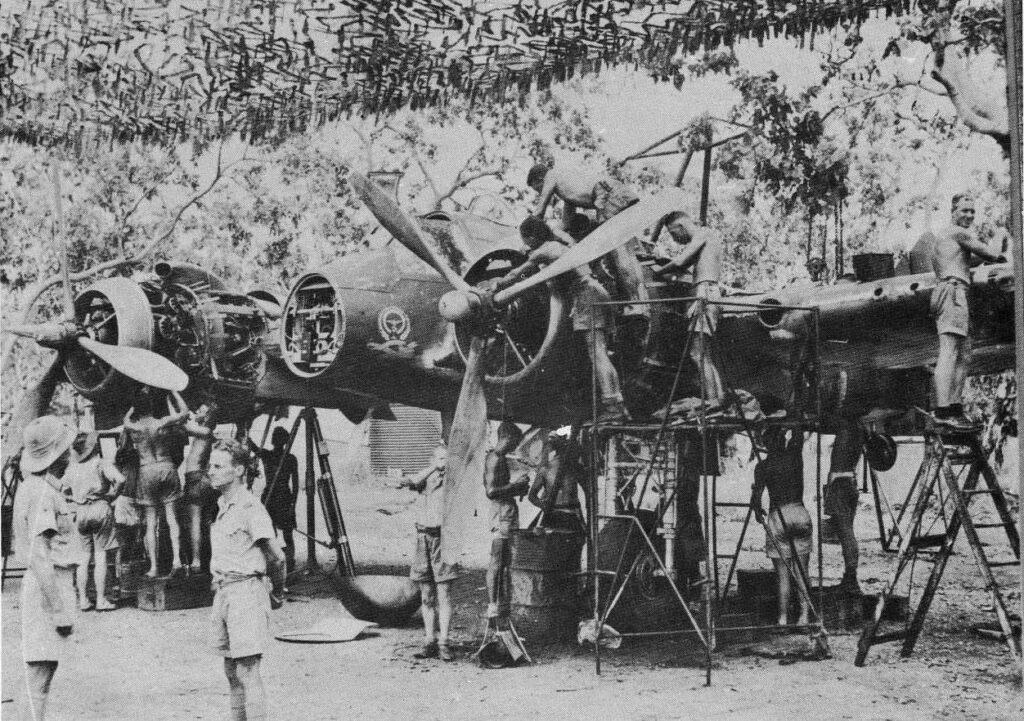 RAAF Bristol Beaufighter Mk 1C A19-15 undergoing maintenance in the field. Wards Strip New Guinea in 1943