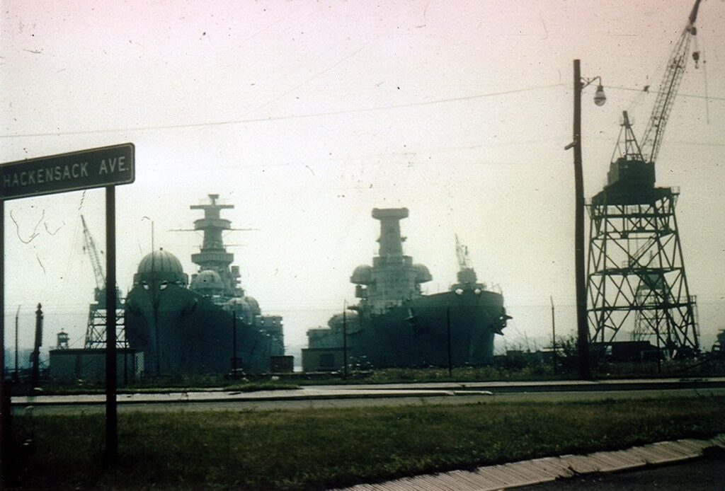 ex-Alaska (CB-1) (left) and ex-Washington (BB-56) (right) awaiting scrapping in Newark NJ 30 June 1961