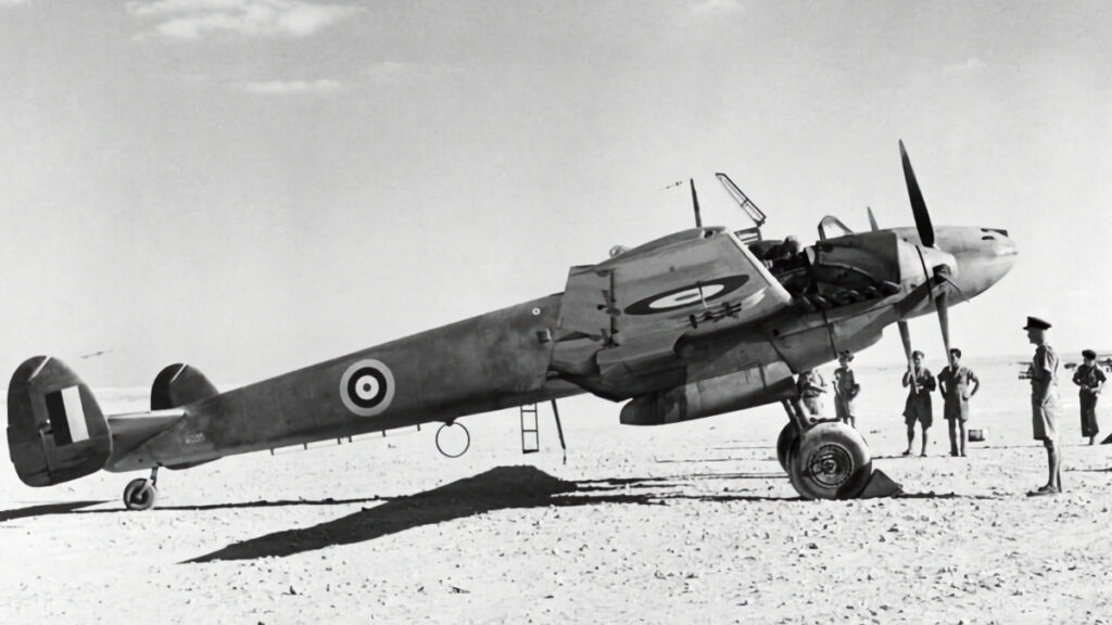 Messerschmitt Bf 110D The Belle of Berlin in British markings on a landing ground in North Africa. This aircraft served with II/ZG76 in Iraq and was captured after crash-landing near Mosul in May 1941. It was used as a communications aircraft and later as a unit 'hack' by No.267 Squadron RAF