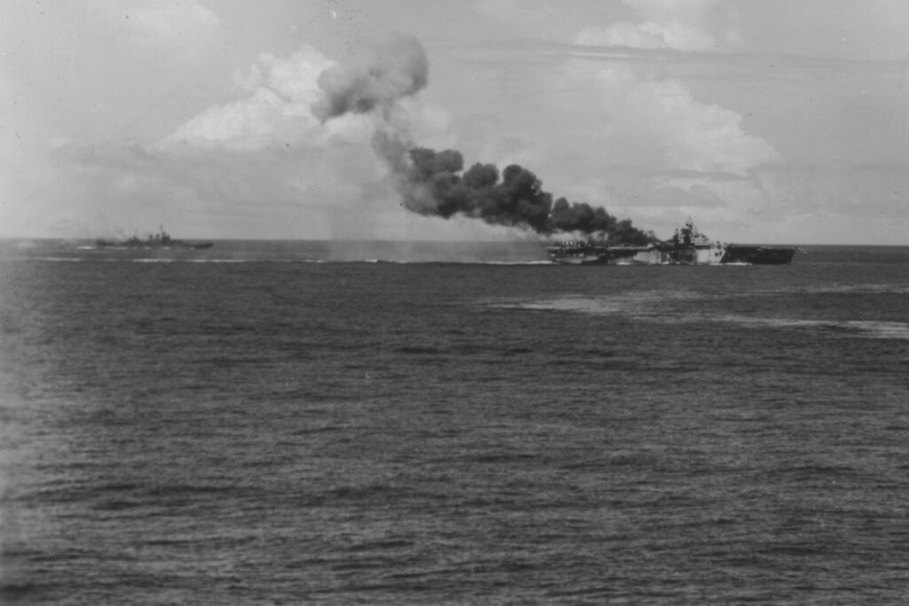 USS Franklin (CV-13) underway in Task Group (TG) 38.4 after being hit by a Zero kamikaze