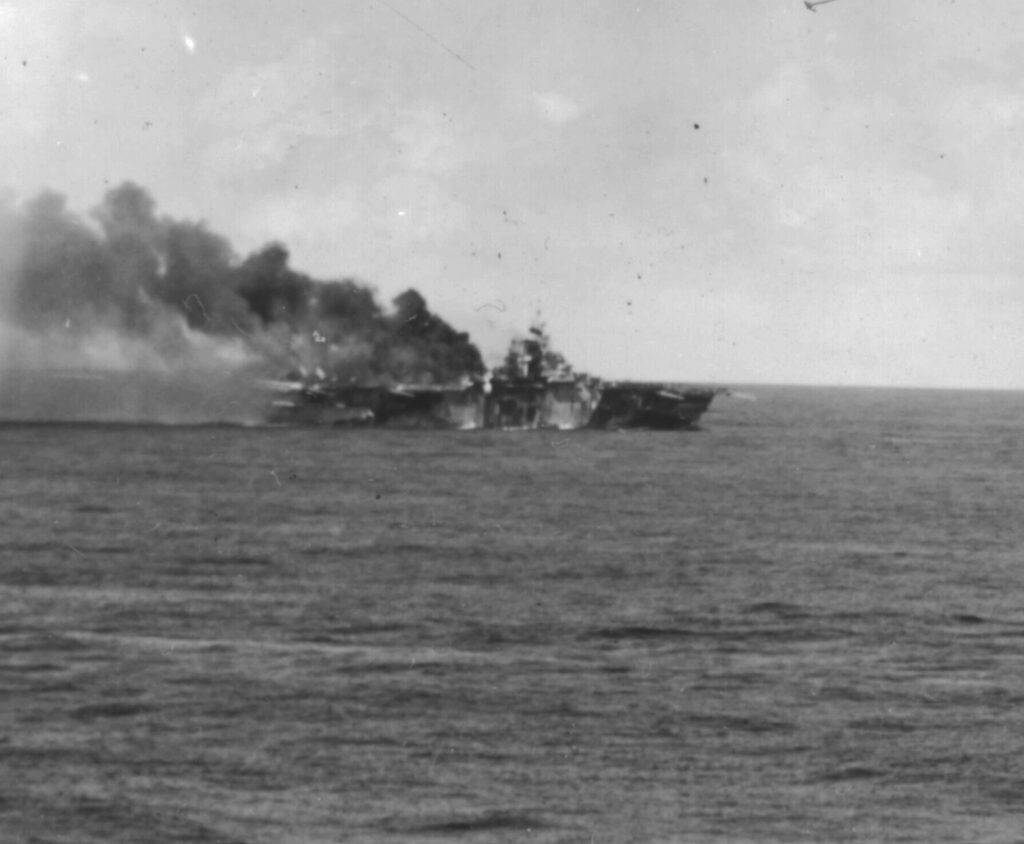 USS Franklin (CV-13) underway in Task Group (TG) 38.4 after being hit by a Zero kamikaze