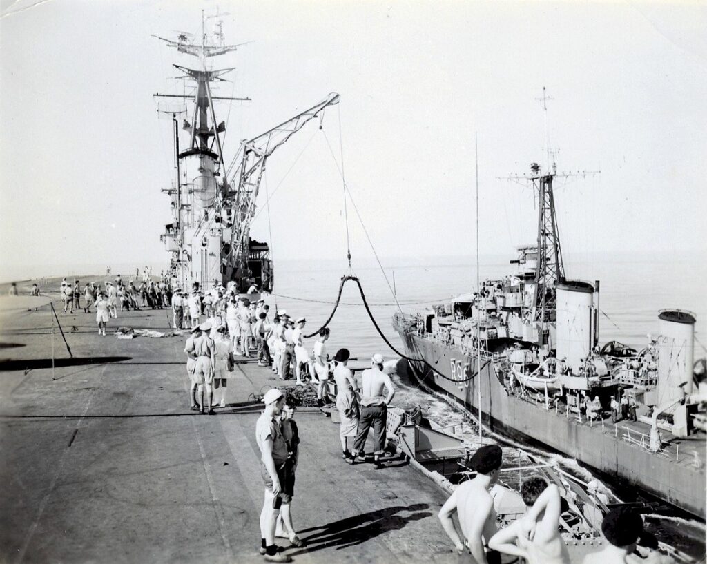 HMCS Warrior (R31) fueling HMCS Nootka R96 during deployment to the Pacific Ocean in 1947