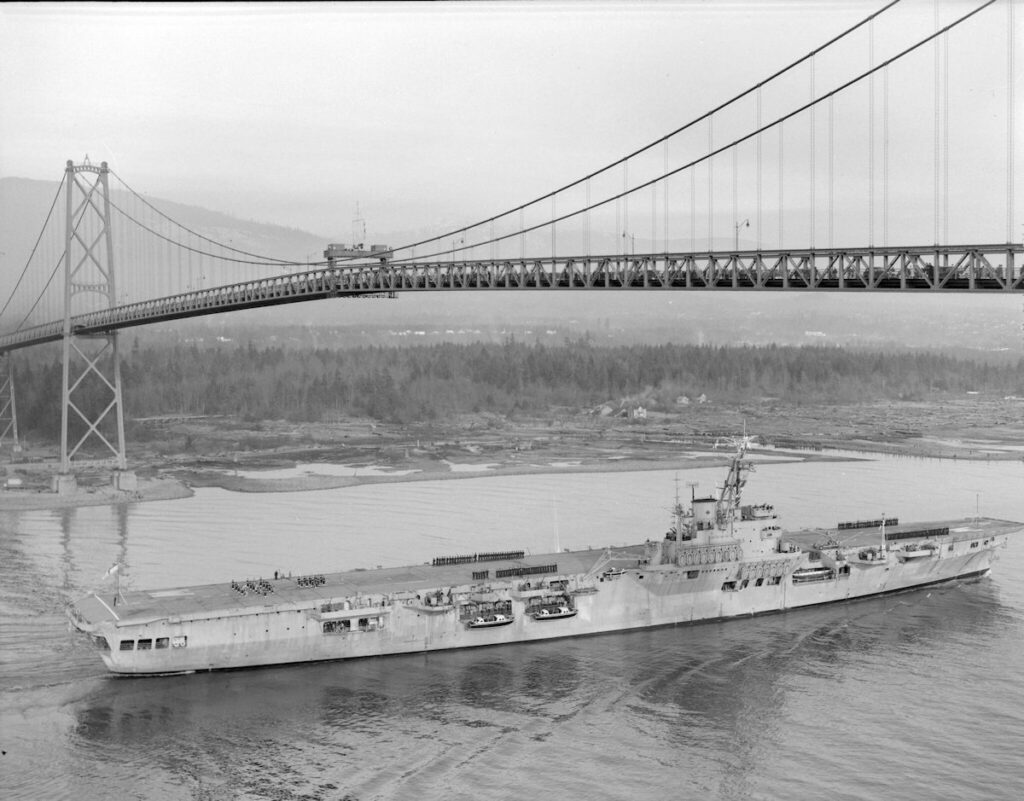 HMCS Warrior going under the Lions Gate Bridge 10 February 1947