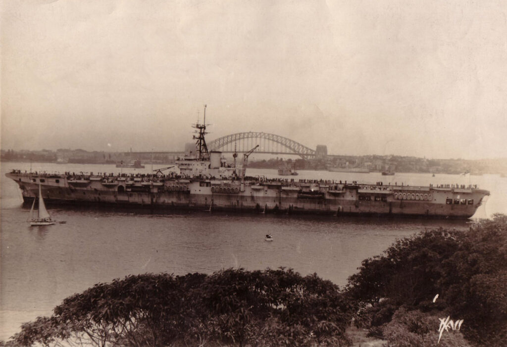 HMS Vengeance moored in Sydney Harbour at the end of WWII